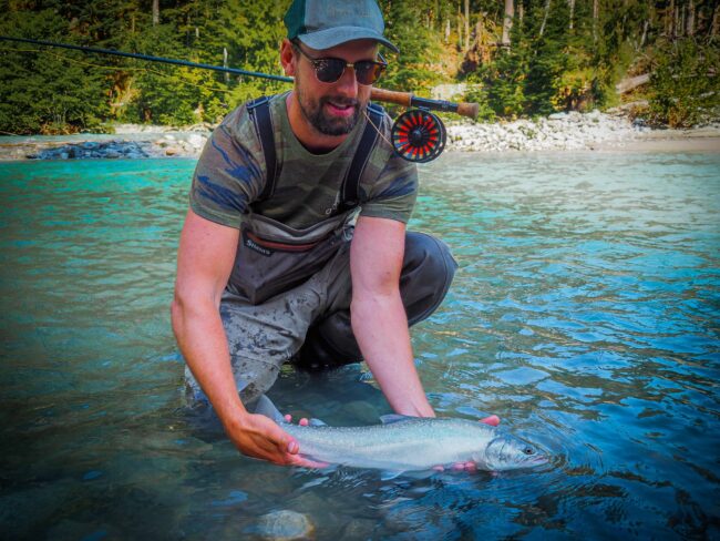 Evan Holmgren with a Pitt River Wilderness Lodge Bulltrout