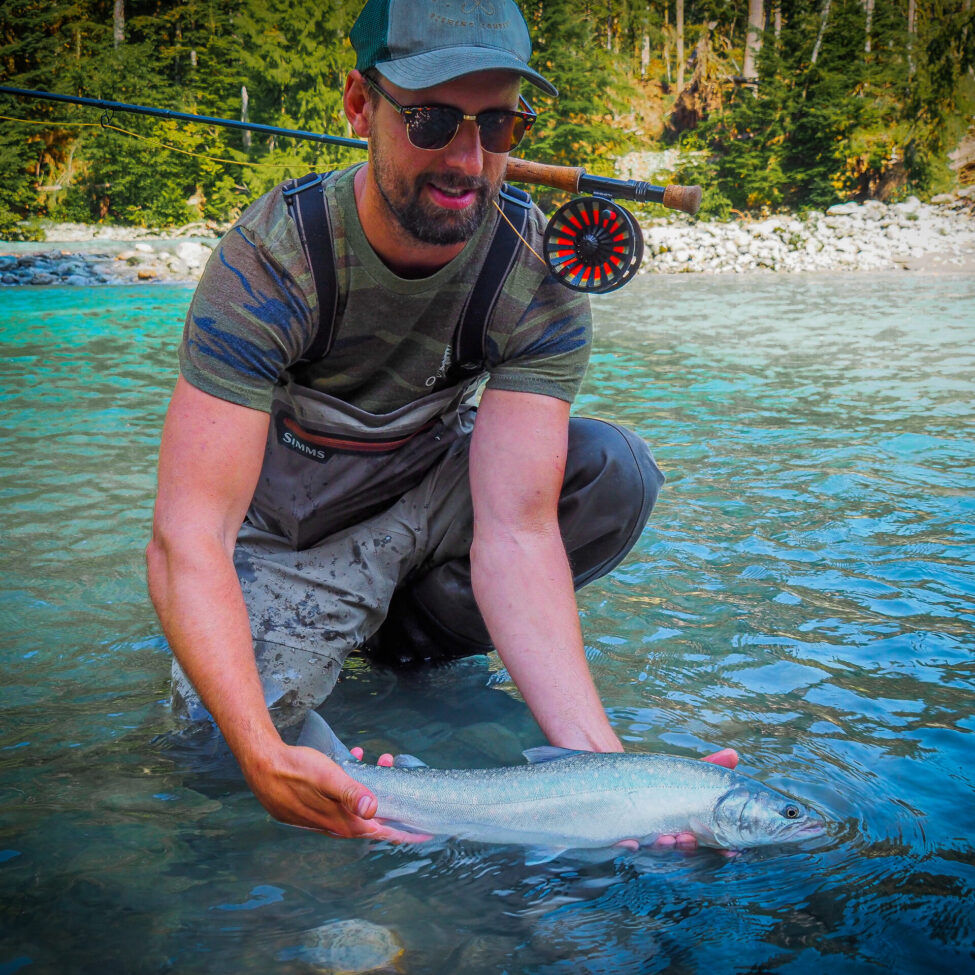 Evan Holmgren with a Pitt River Wilderness Lodge Bulltrout